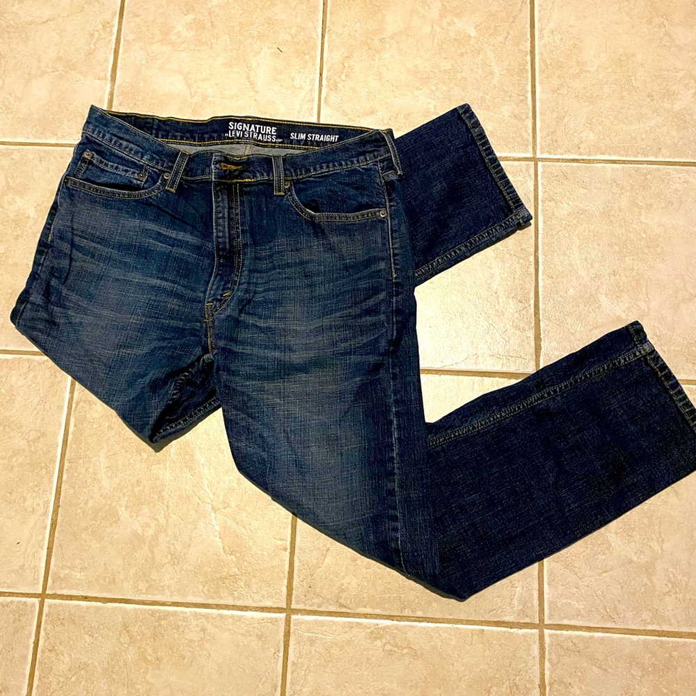 Levi Strauss slim straight jeans.
